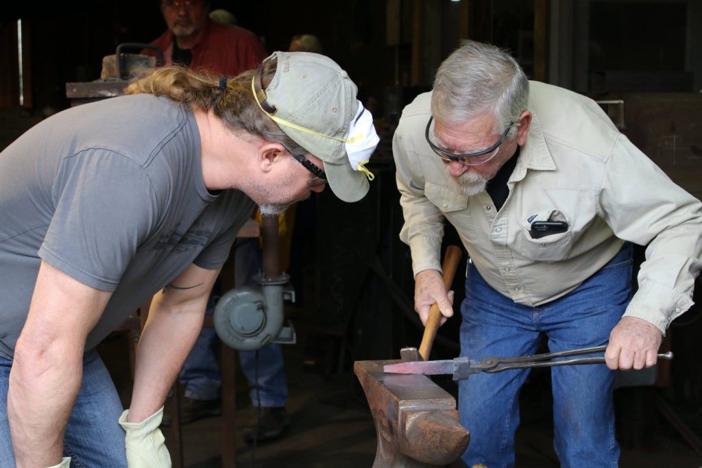 Don McIntosh, Coordinator of the Bill Moran School of Bladesmithing, helping a student during our Intro to Bladesmithing course